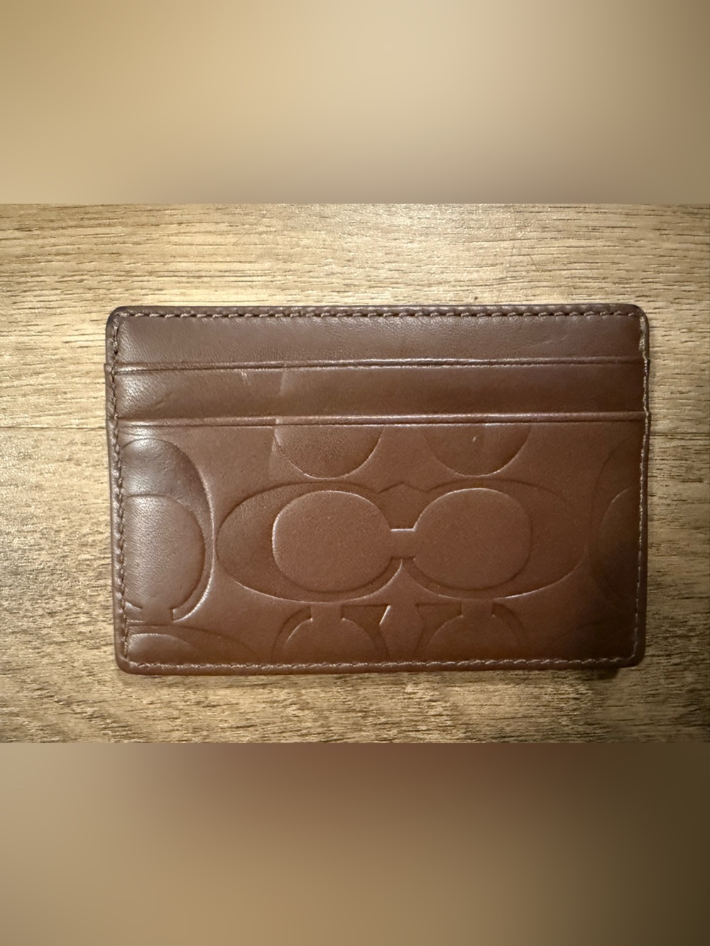 Embossed coach Leather Wallet in Brown